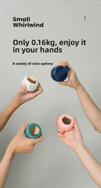 Promotional graphic for the Small Whirlwind speaker showing four hands holding different color options of the compact cylindrical speaker against a light gray background with text.
